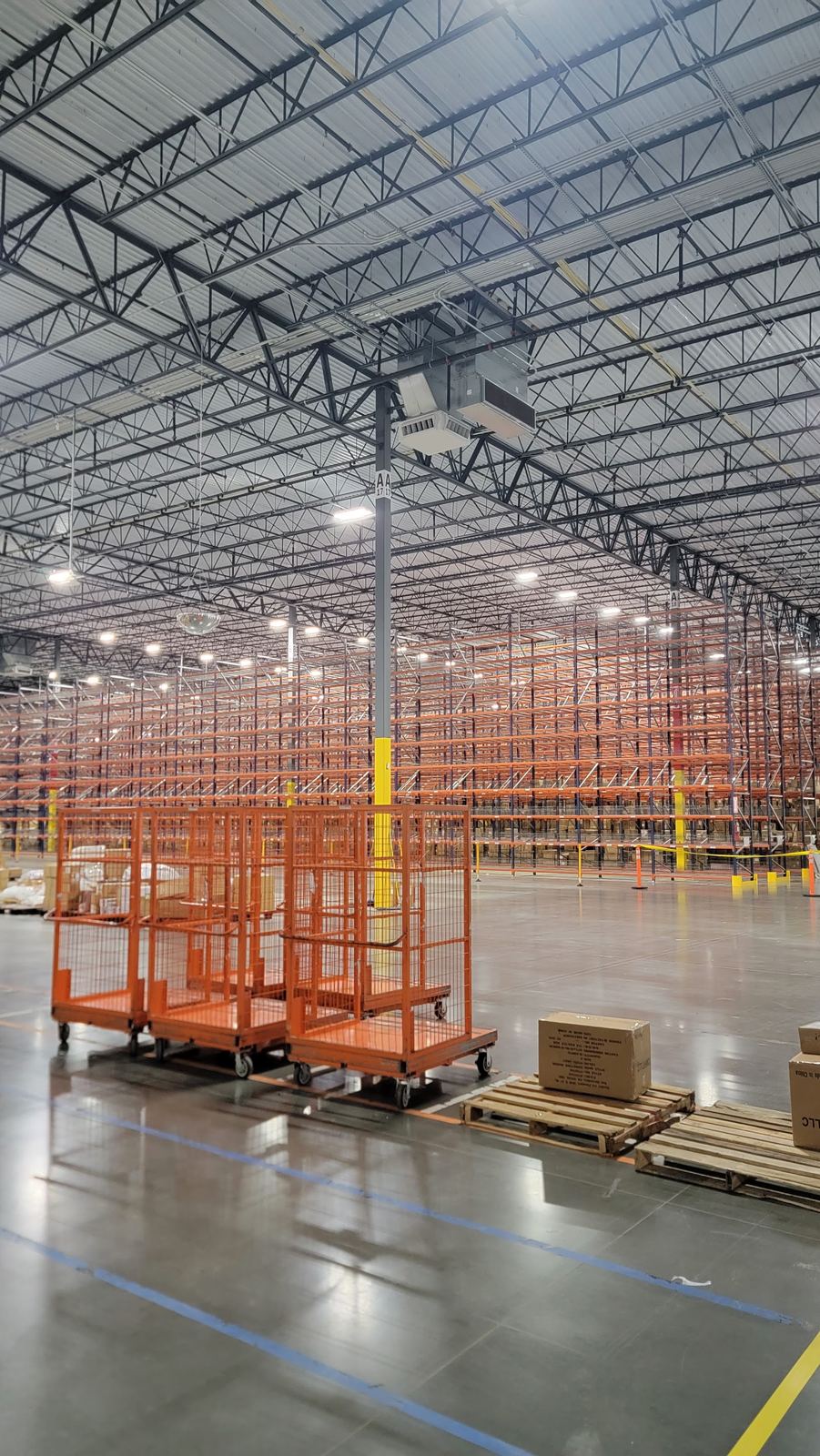 Finished commercial LED lighting upgrade inside warehouse