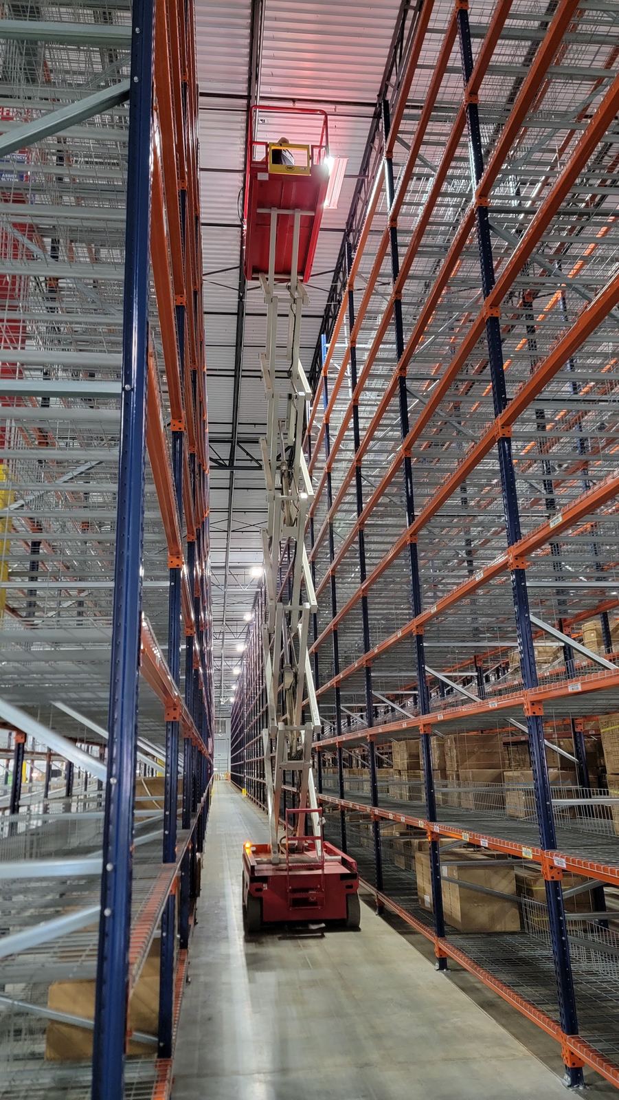 Warehouse LED lighting fixture installation detail