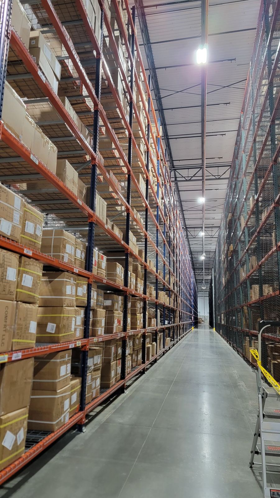 Warehouse LED lighting installation work in progress